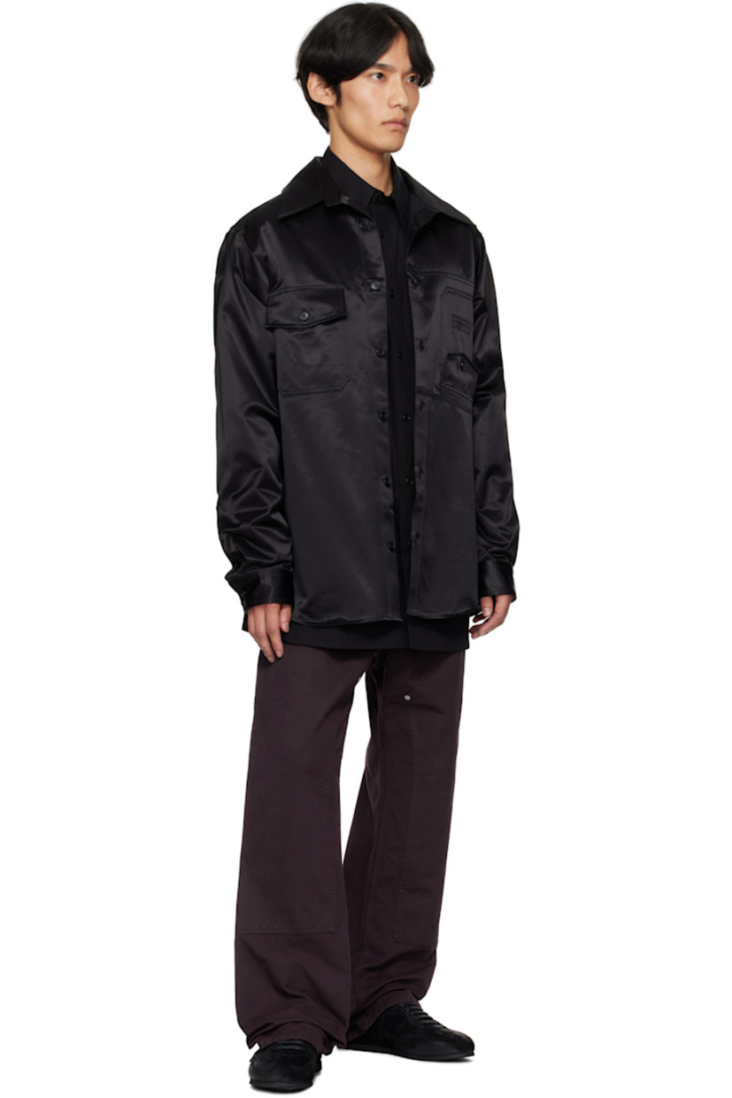 Cotton- and viscose-blend satin shirt. 

· Spread collar
· Button closure 
· Flap pockets at chest
· Logo embroidered at flap pocket
· Shirttail hem 
· Buttoned barrel cuffs
· White stitching at back collar 
· Twin pleats at back yoke 

Supplier color: Black