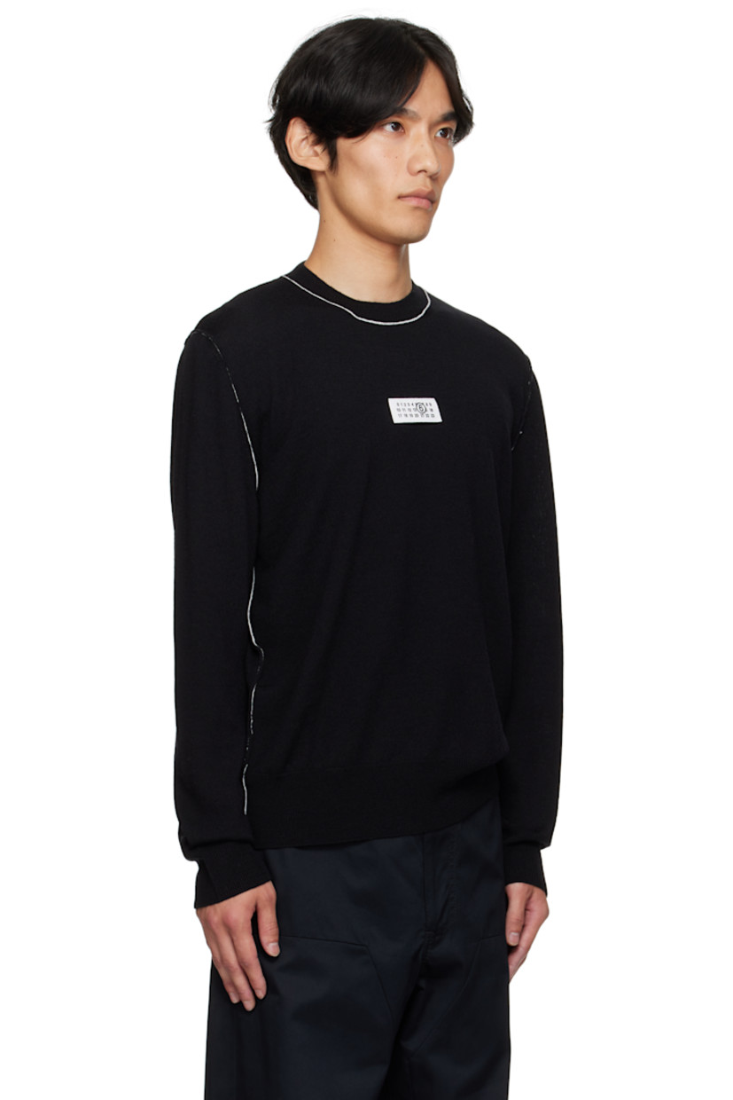 Knit virgin wool-blend sweater. 

· Rib-knit crewneck, hem, and cuffs
· Logo patch at front 
· White stitching at back collar 
· Contrast stitching in white 

Supplier color: Black