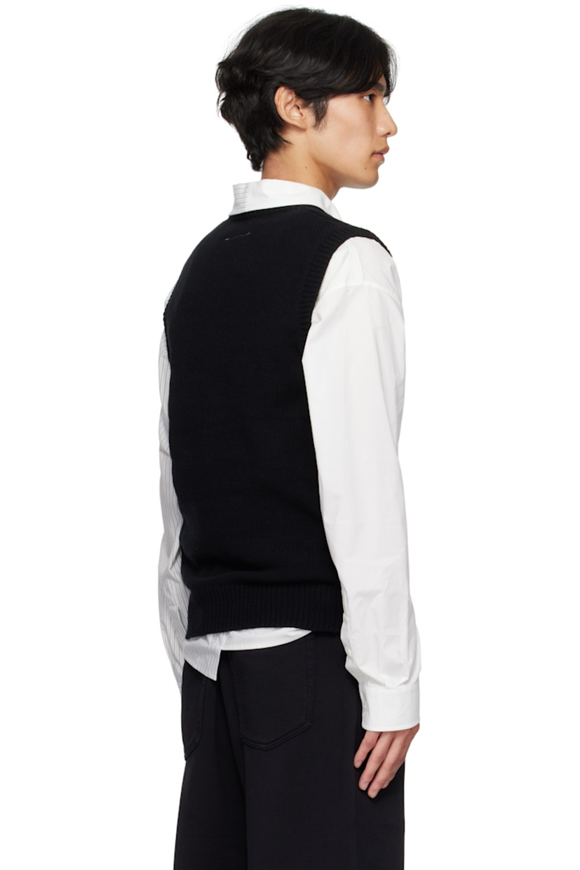 Knit wool-blend sweater. 

· Rib-knit V-neck, hem, and armscyes
· Bonded detailing at front 
· White stitching at back collar 

Supplier color: Black
