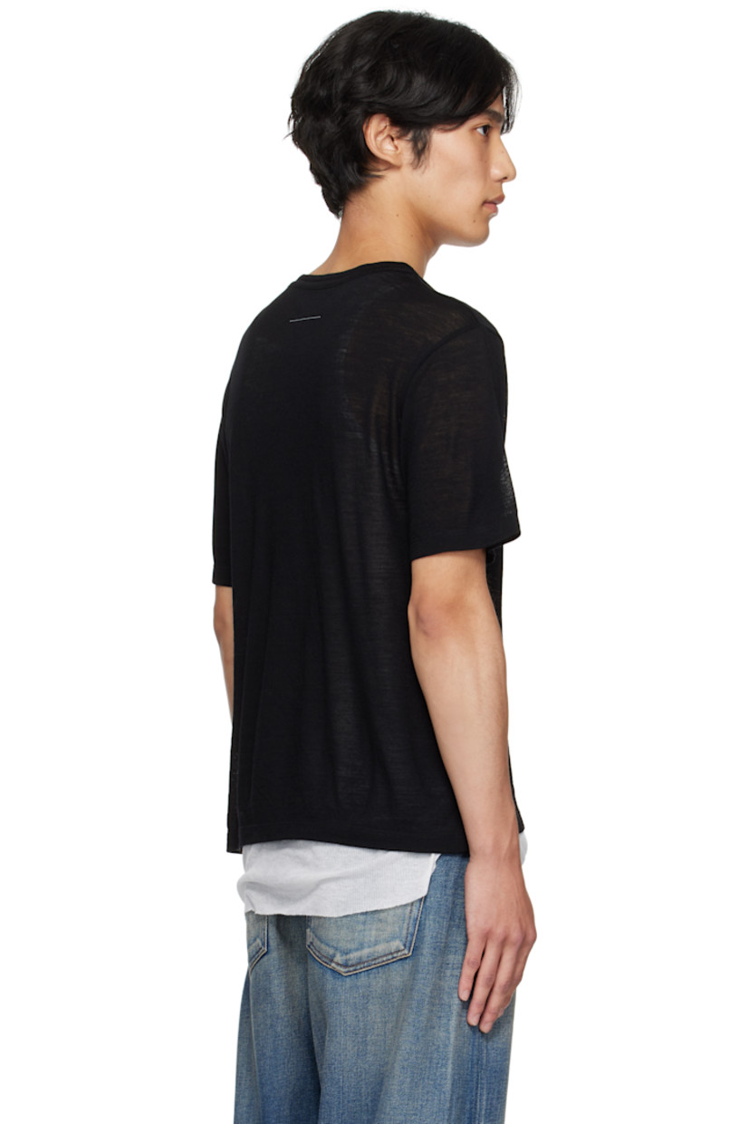 Semi-sheer wool jersey T-shirt. 

· Rib-knit crewneck
· Text and logo printed at front 
· White stitching at back collar 

Supplier color: Black