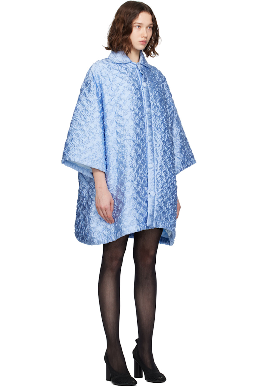 Silk-blend cloqué coat. 

· Spread collar
· Button closure
· Raglan sleeves
· Full satin lining 

Supplier color: Pale blue