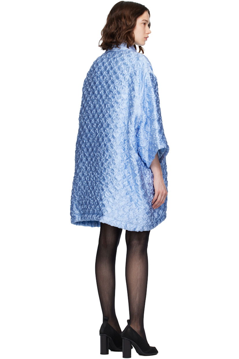 Silk-blend cloqué coat. 

· Spread collar
· Button closure
· Raglan sleeves
· Full satin lining 

Supplier color: Pale blue