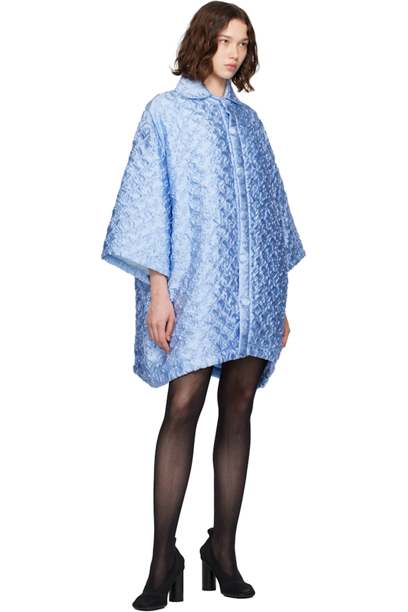 Silk-blend cloqué coat. 

· Spread collar
· Button closure
· Raglan sleeves
· Full satin lining 

Supplier color: Pale blue