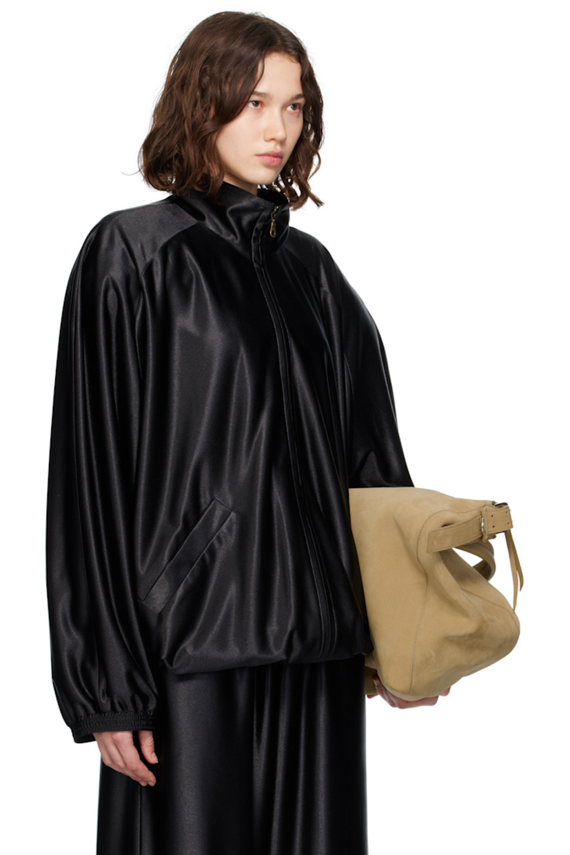 Polyester satin jacket. 

· Stand collar 
· Zip closure
· Welt pockets
· Elasticized hem and cuffs
· Detachable padding at raglan sleeves 
· Full satin lining 

Supplier color: Black