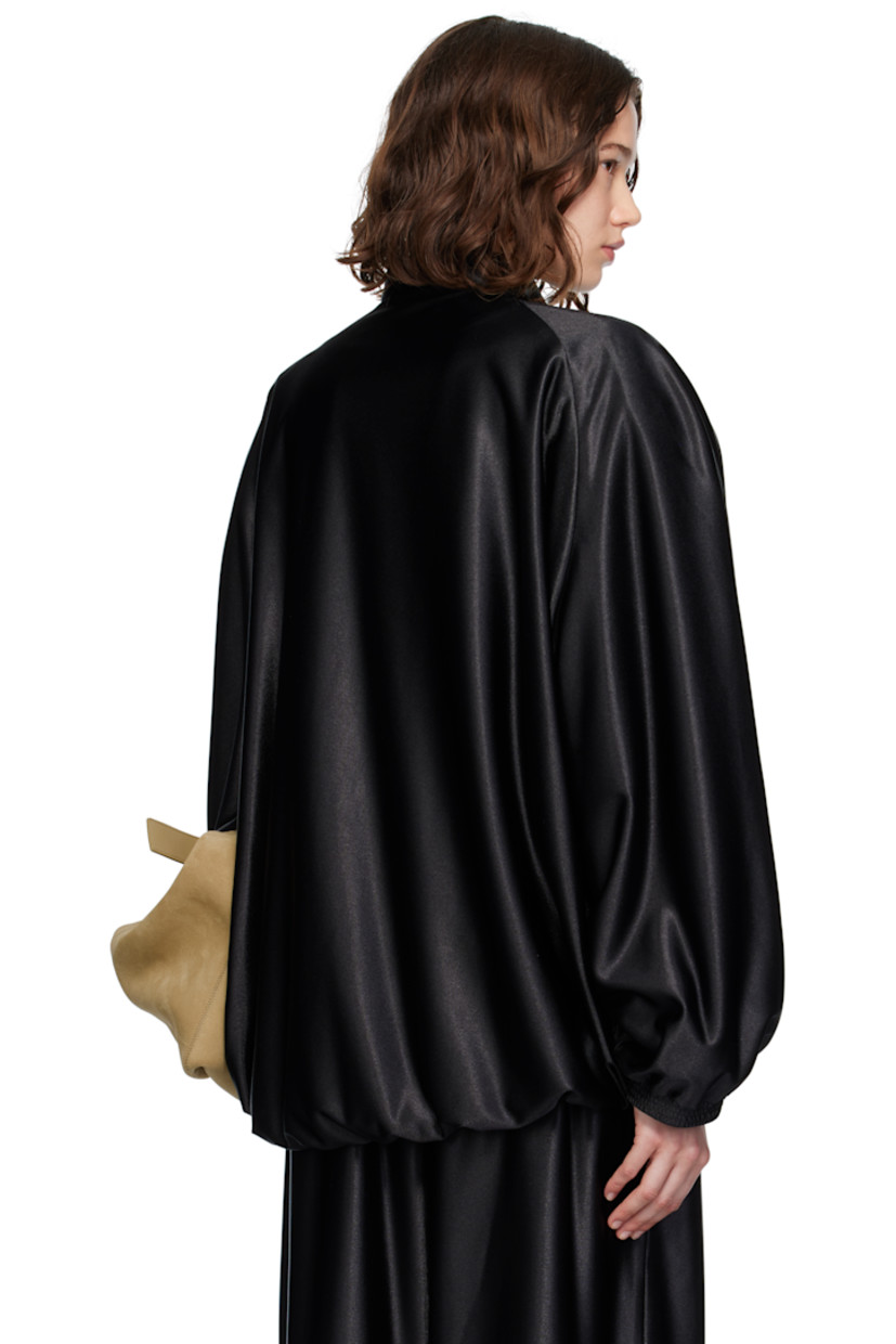 Polyester satin jacket. 

· Stand collar 
· Zip closure
· Welt pockets
· Elasticized hem and cuffs
· Detachable padding at raglan sleeves 
· Full satin lining 

Supplier color: Black