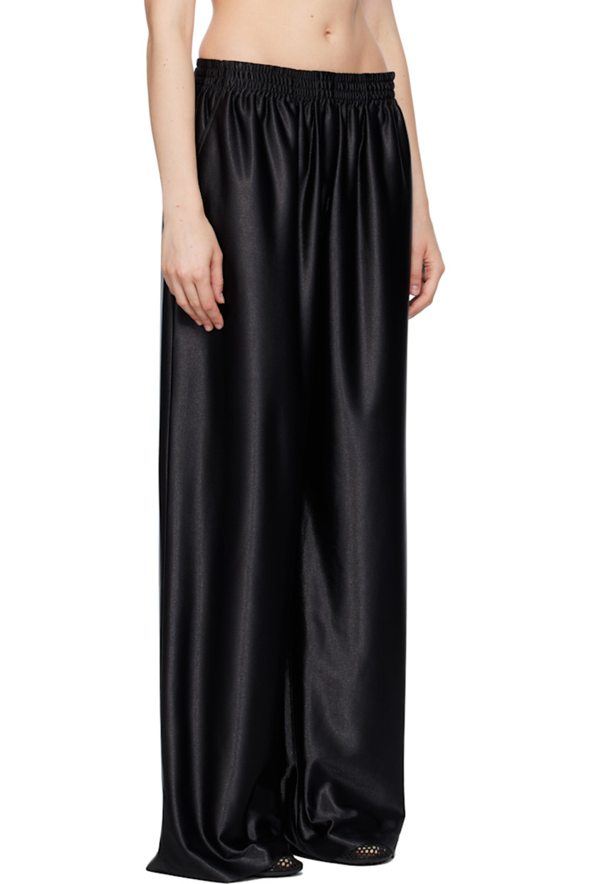 Polyester satin trousers. 

· Elasticized waistband
· Two-pocket styling
· Mock fly 
· Partial plain-woven lining 

Supplier color: Black