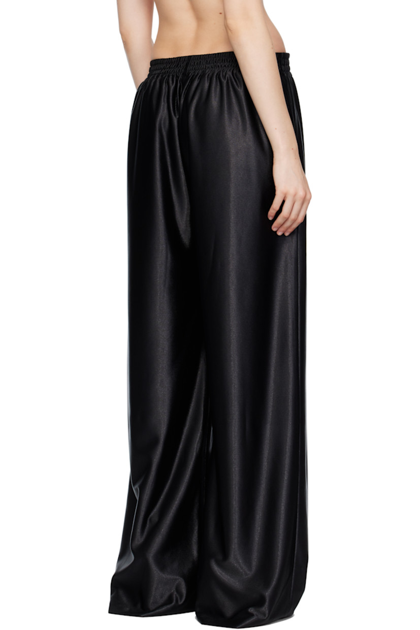 Polyester satin trousers. 

· Elasticized waistband
· Two-pocket styling
· Mock fly 
· Partial plain-woven lining 

Supplier color: Black
