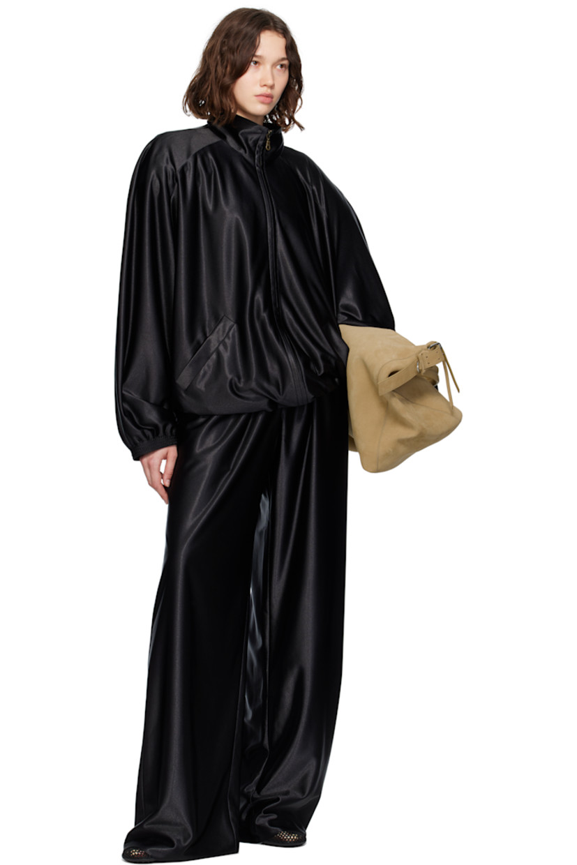Polyester satin trousers. 

· Elasticized waistband
· Two-pocket styling
· Mock fly 
· Partial plain-woven lining 

Supplier color: Black