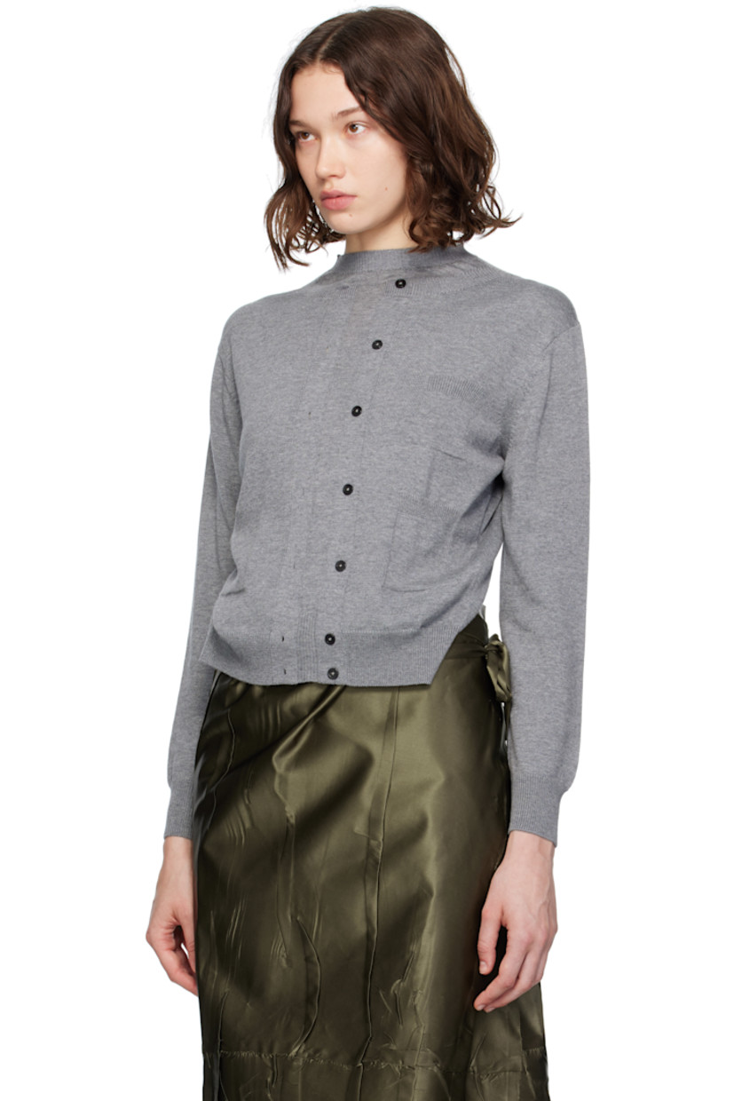 Knit wool- and cotton-blend cardigan. Rib-knit trim throughout.

· Crewneck
· Button placket and buttonholes at front
· Button closure and cutout at back

Supplier color: Grey
