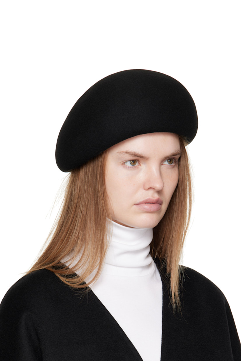 Structured wool felt beret.

· Knit browband 
· Unlined

Supplier color: Black