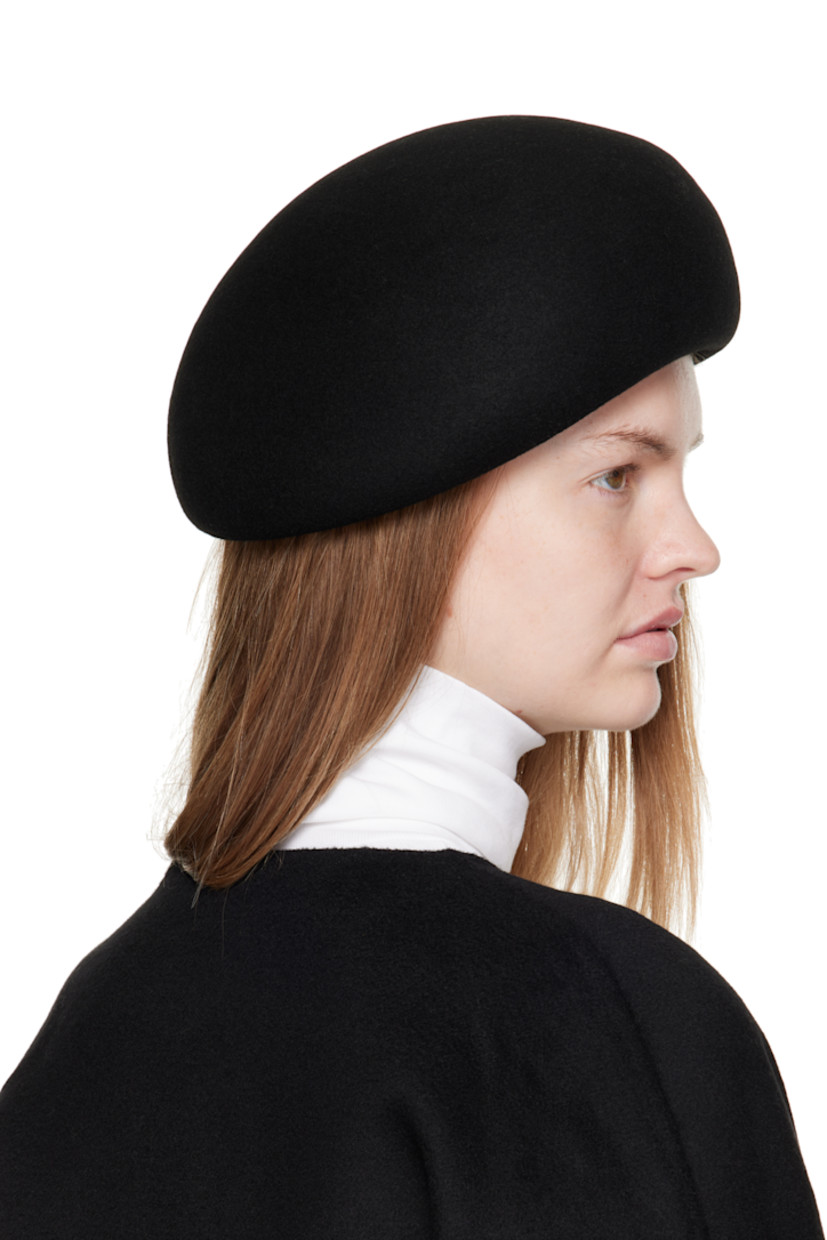 Structured wool felt beret.

· Knit browband 
· Unlined

Supplier color: Black