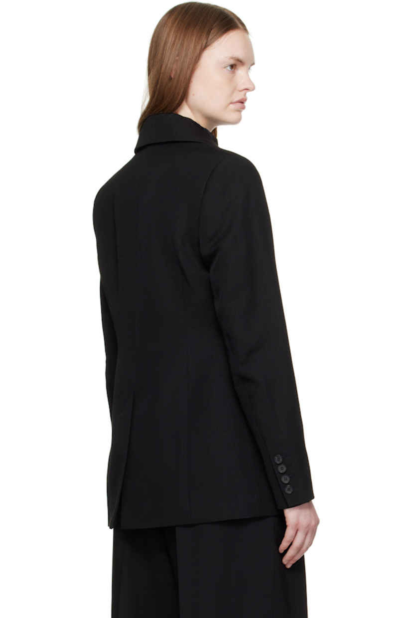 Woven virgin wool- and silk-blend blazer.

· Notched lapel
· Double-breasted button closure
· Flap pockets at waist
· Padded shoulders
· Surgeon's cuffs
· Central vent at back hem
· Full silk satin lining
· Horn hardware

Supplier color: Black
