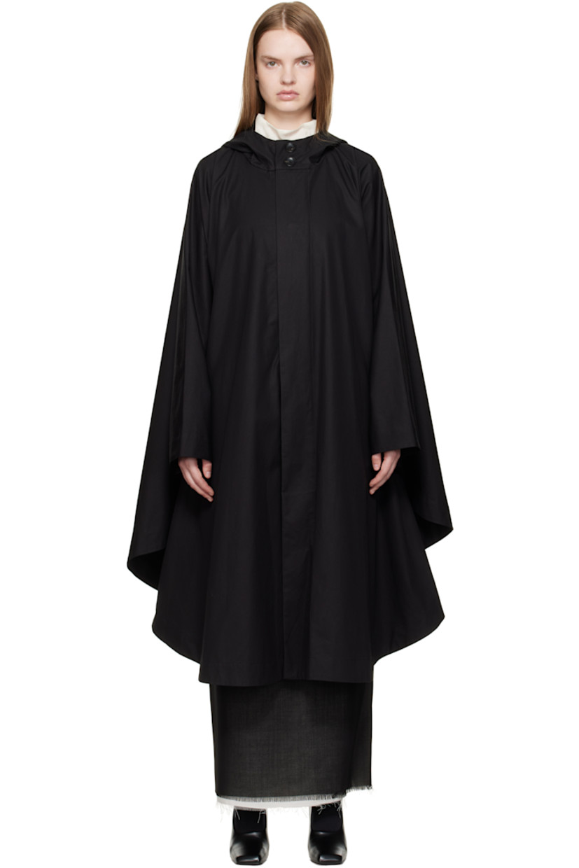 Water-repellent organic cotton gabardine cape-style raincoat.

· Stand collar
· Concealed button closure
· Adjustable button fastening at cuffs
· Unlined

Supplier color: Black