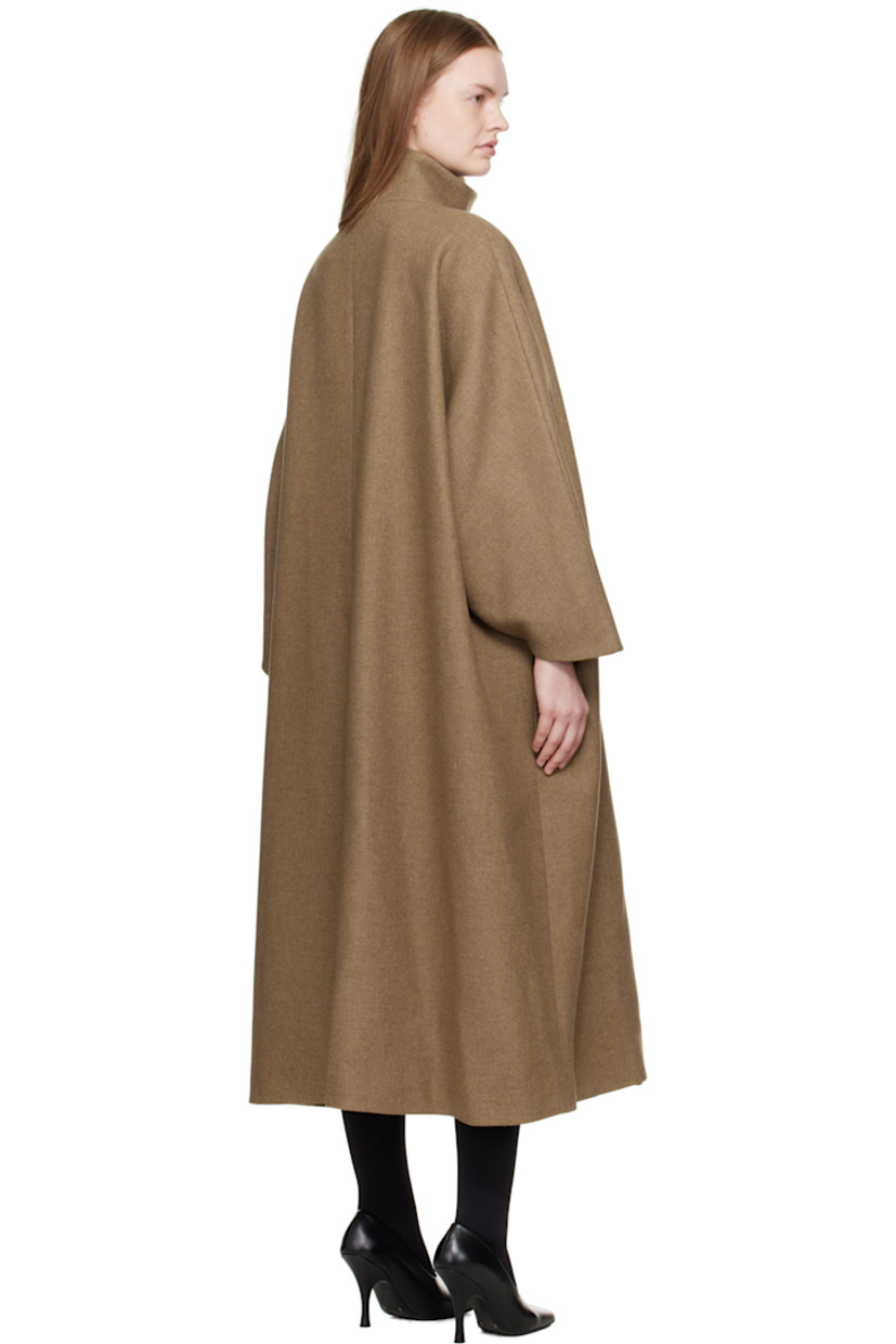 Recycled wool-blend melton coat.

· Funnel neck
· Concealed button closure
· Welt pockets at waist
· Dolman sleeves
· Full silk satin lining

Supplier color: Khaki