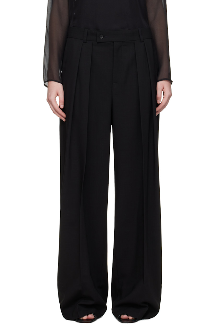 Wool twill trousers.

· Wide-leg
· Mid-to-low rise
· Belt loops
· Four-pocket styling
· Zip fly
· Pleats at front
· Creased legs

Supplier color: Black