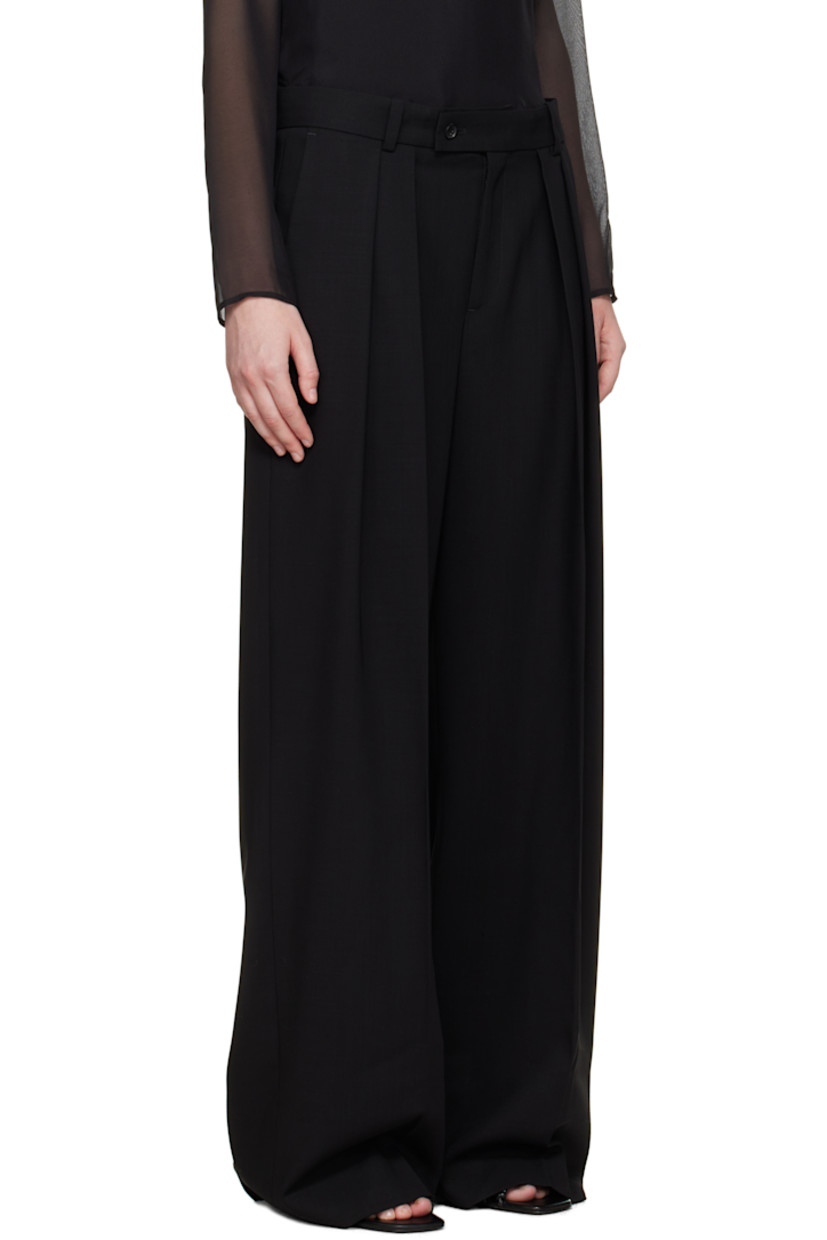Wool twill trousers.

· Wide-leg
· Mid-to-low rise
· Belt loops
· Four-pocket styling
· Zip fly
· Pleats at front
· Creased legs

Supplier color: Black
