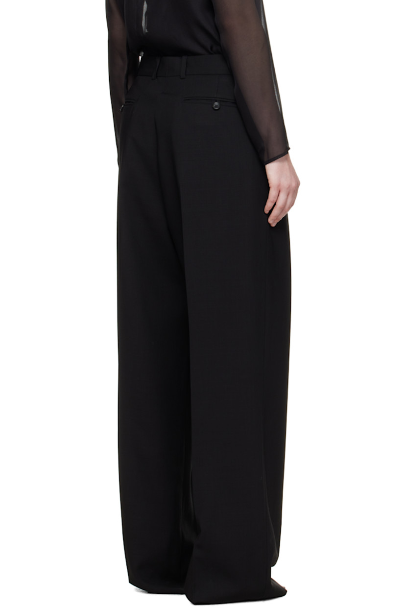 Wool twill trousers.

· Wide-leg
· Mid-to-low rise
· Belt loops
· Four-pocket styling
· Zip fly
· Pleats at front
· Creased legs

Supplier color: Black