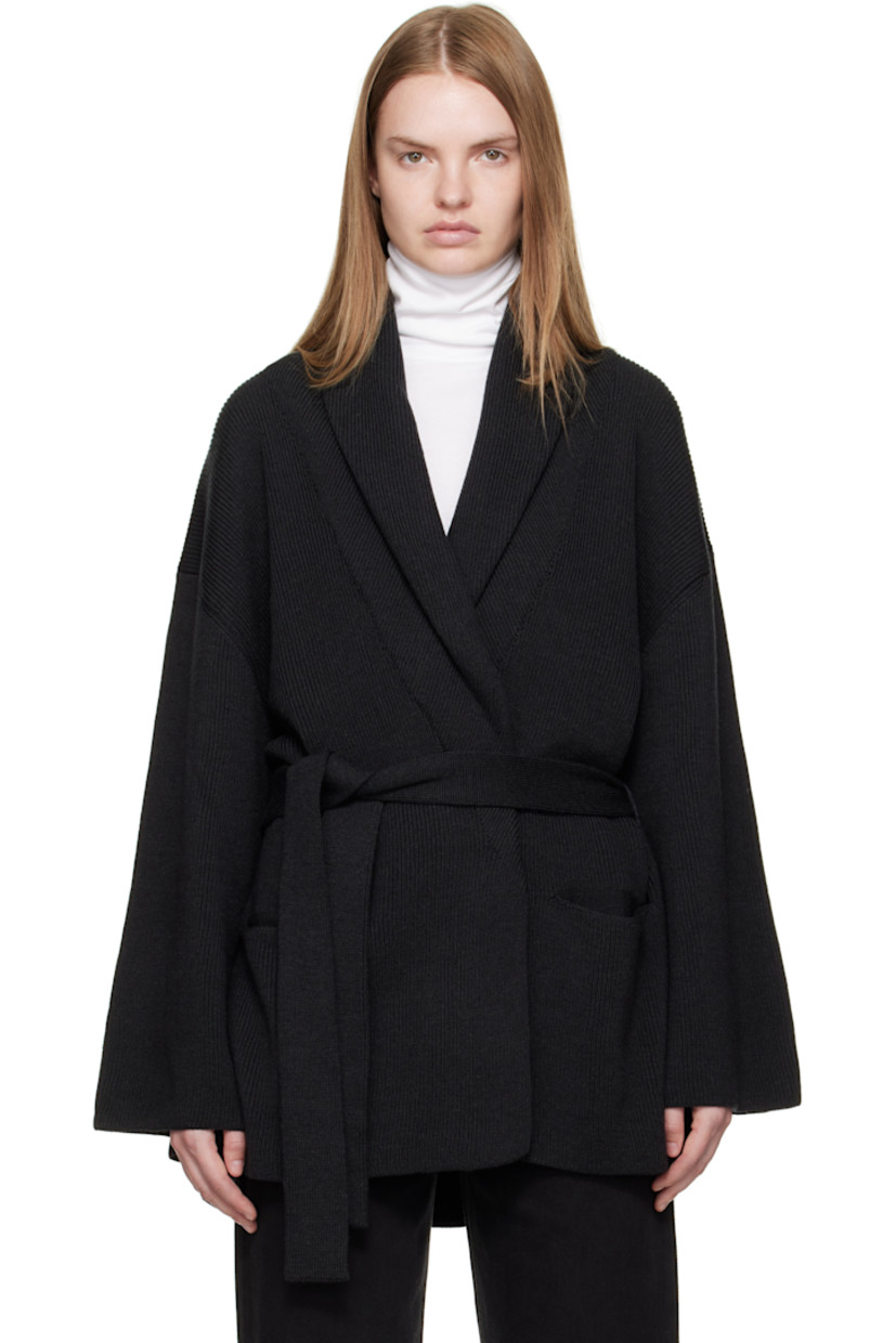 Rib-knit virgin wool cardigan.

· Shawl lapel
· Open front
· Belt loops and self-tie belt
· Welt pockets at front

Supplier color: Dark grey