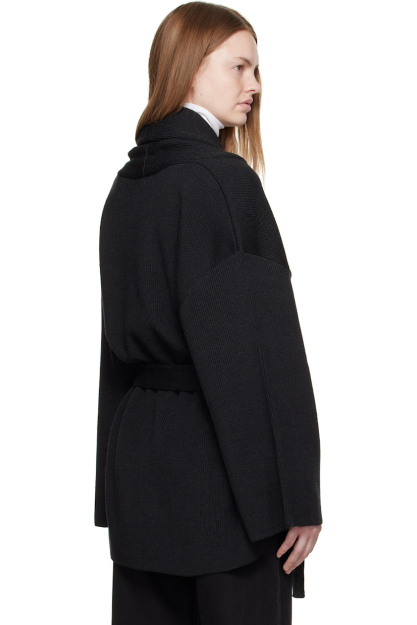 Rib-knit virgin wool cardigan.

· Shawl lapel
· Open front
· Belt loops and self-tie belt
· Welt pockets at front

Supplier color: Dark grey