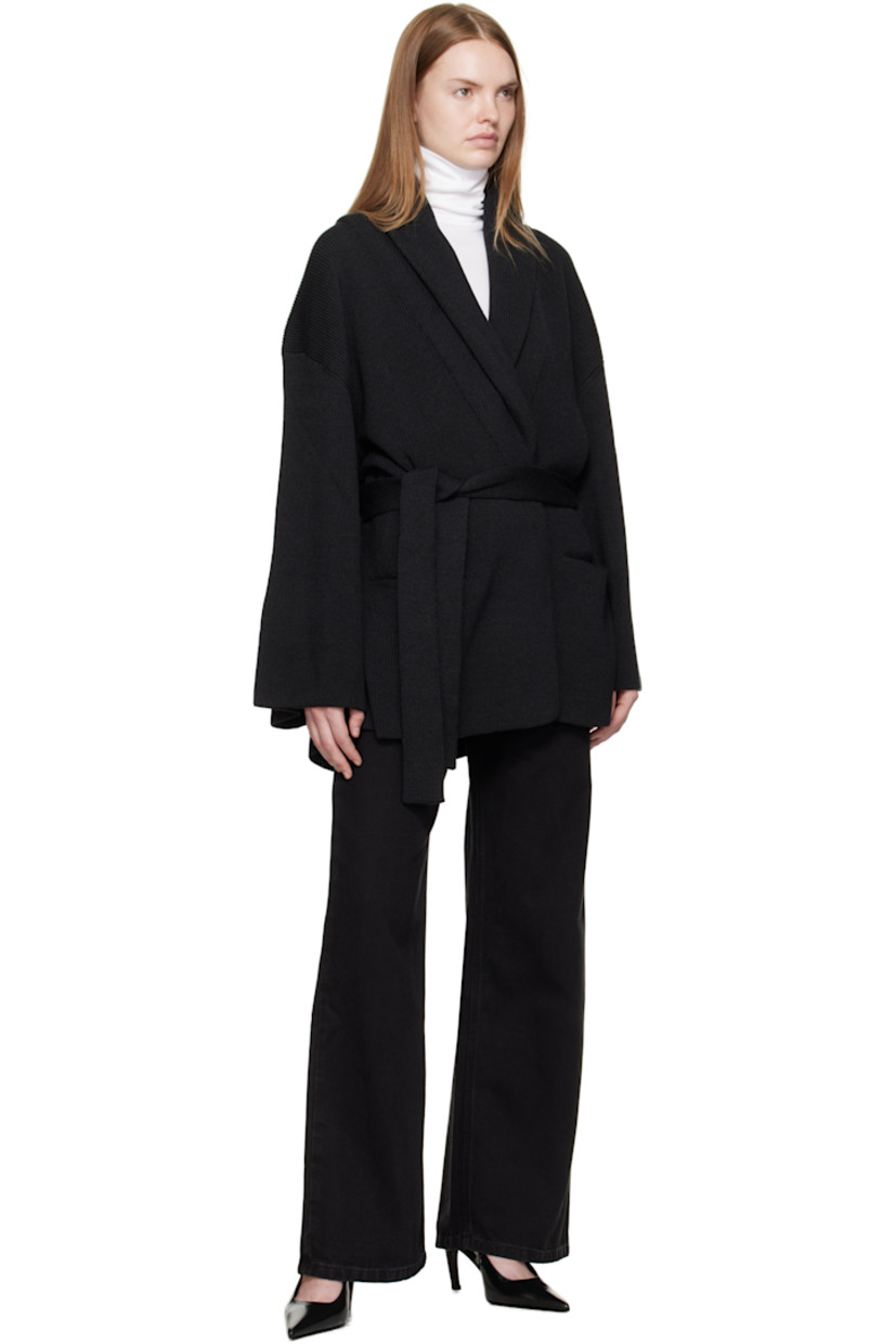 Rib-knit virgin wool cardigan.

· Shawl lapel
· Open front
· Belt loops and self-tie belt
· Welt pockets at front

Supplier color: Dark grey