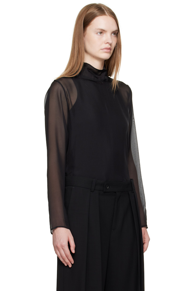Sheer silk chiffon blouse.

· Button fastening at turtleneck
· Mother-of-pearl hardware

Supplier color: Black