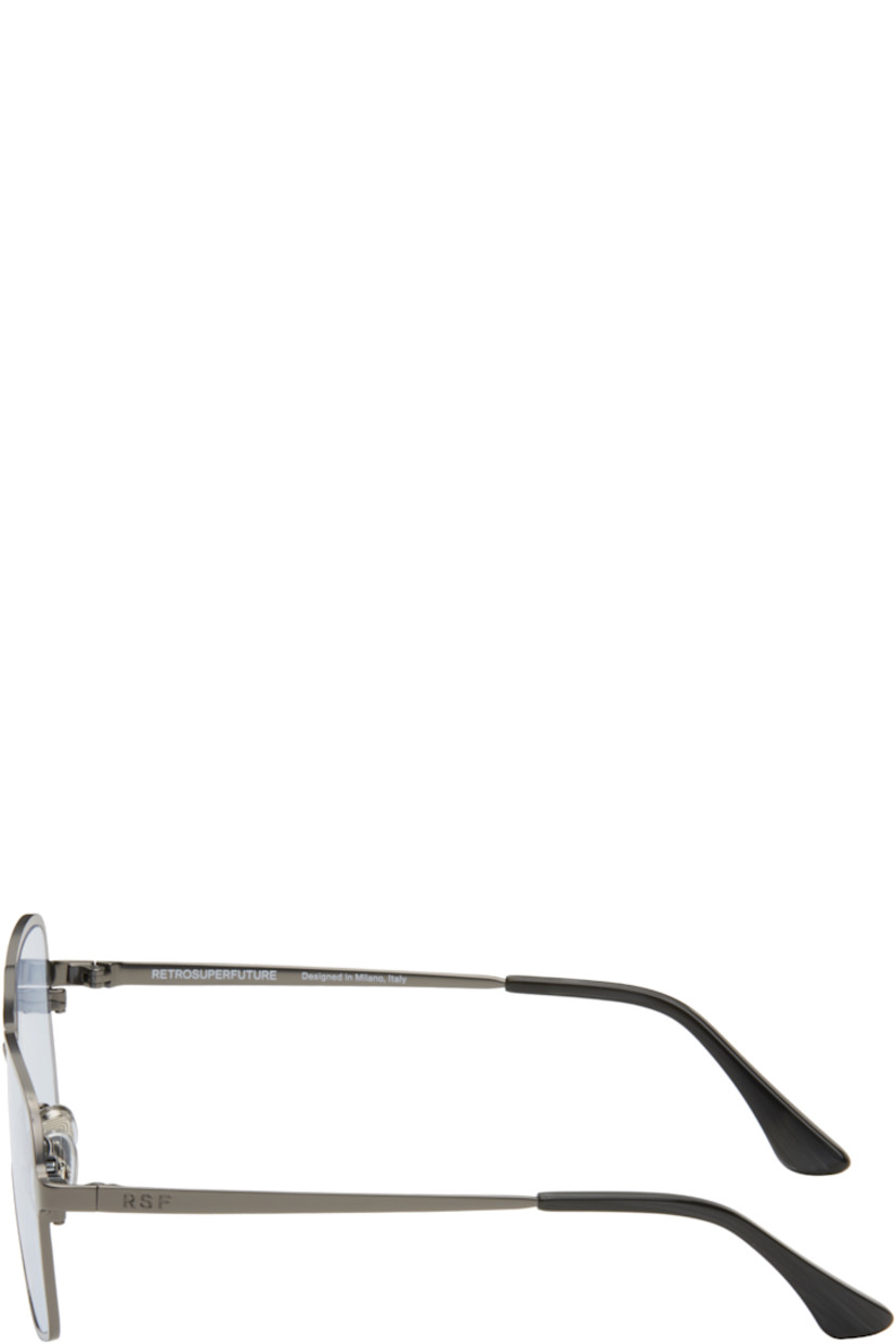 Aviator-style metal-frame sunglasses in gunmetal tone.

· Blue lenses
· Top bar
· Adjustable rubber nose pads
· Logo engraved at temples
· Acetate temple tips
· Includes pouch
· Size: 56.15 145

Supplier color: Blue/Gun