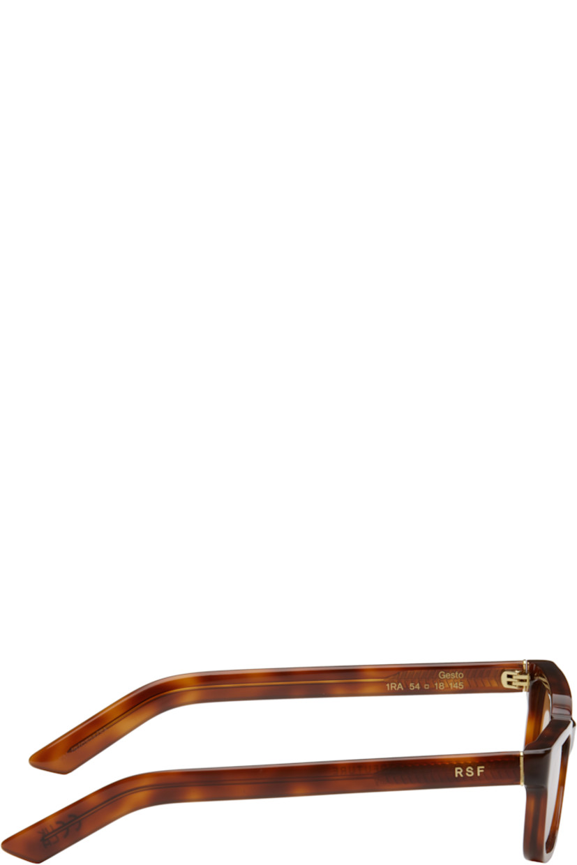 Rectangular semi-transparent tortoiseshell acetate-frame sunglasses in brown.

· Handcrafted
· Brown lenses
· 100% UVA/UVB protection, category 3
· Integrated nose pads
· Inset logo hardware at temples
· Exposed core wires
· Includes pouch
· Size: 54.18 145

Supplier color: Havana diversa
