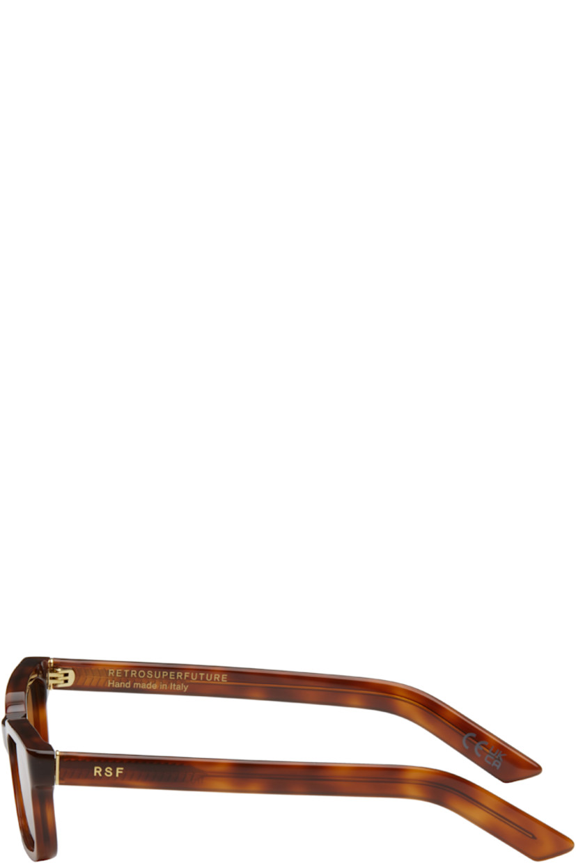 Rectangular semi-transparent tortoiseshell acetate-frame sunglasses in brown.

· Handcrafted
· Brown lenses
· 100% UVA/UVB protection, category 3
· Integrated nose pads
· Inset logo hardware at temples
· Exposed core wires
· Includes pouch
· Size: 54.18 145

Supplier color: Havana diversa