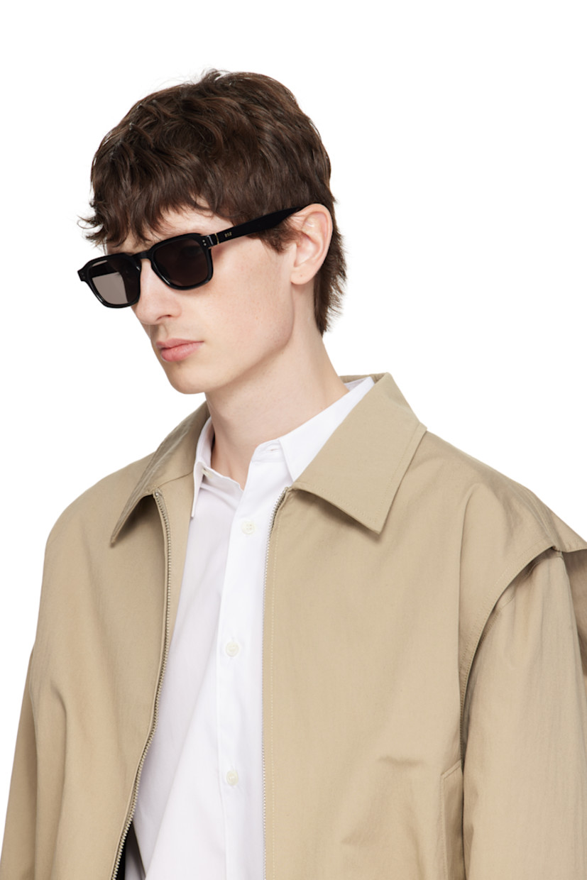 Handcrafted square acetate-frame sunglasses in black.

· Gray lenses
· Keyhole bridge 
· Integrated nose pads
· Inset logo hardware at temples
· Gold-tone hardware
· Includes pouch
· Size: 50.20 145

Supplier color: Black
