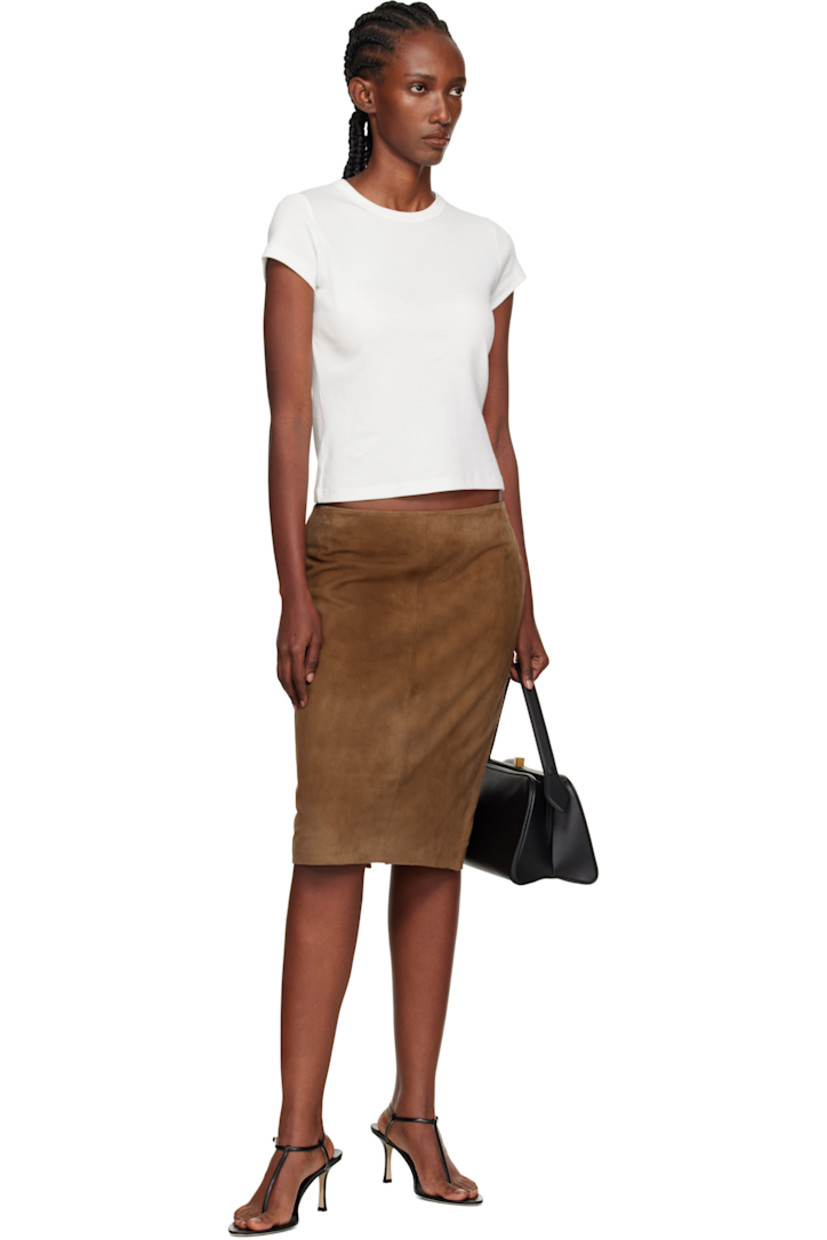 LWG-certified lambskin suede midi skirt. 

· Mid-rise 
· Button fastening and concealed zip closure at back 
· Central vent at back hem 
· Full TENCEL™ lyocell twill lining 

Supplier color: Toffee