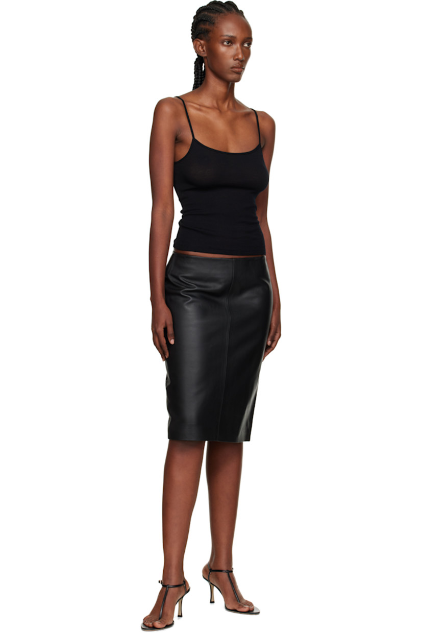 LWG-certified grained lambskin midi skirt.

· Paneled construction
· Button fastening and concealed zip closure at back 
· Central vent at back hem 
· Full TENCEL™ lyocell twill lining 

Supplier color: Black