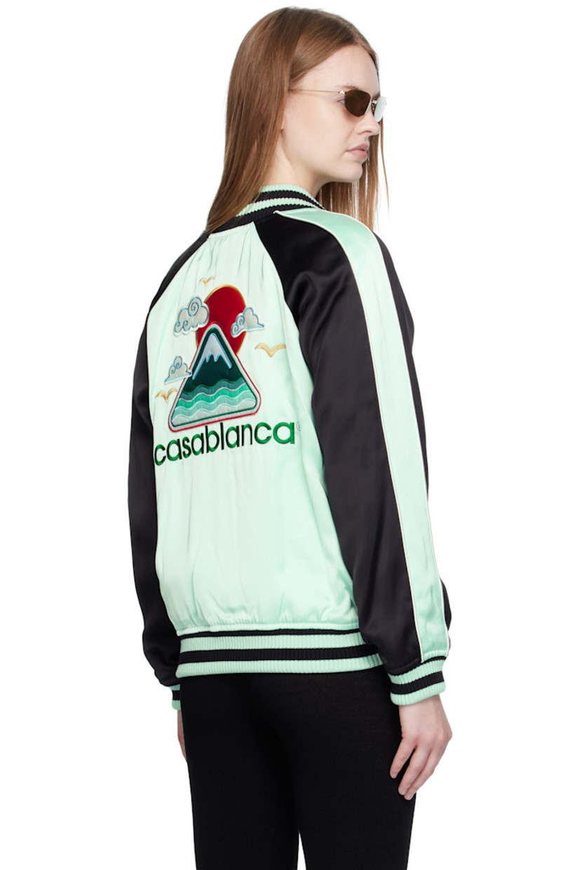 Viscose satin bomber jacket.

· Stripes at rib-knit stand collar, hem, and cuffs
· Zip closure
· Embroidered logo graphic at chest and back
· Welt pockets at waist
· Piping and stripe at raglan sleeves
· Fully lined
· Logo-enameled gold-tone hardware

Supplier color: Black