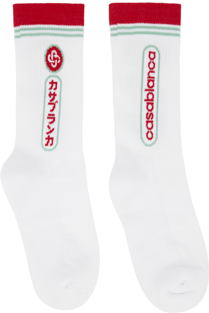 Pair of stretch cotton-blend jersey socks. 

· Rib-knit cuffs 
· Jacquard logo, text, and stripes at cuffs 

Supplier color: White