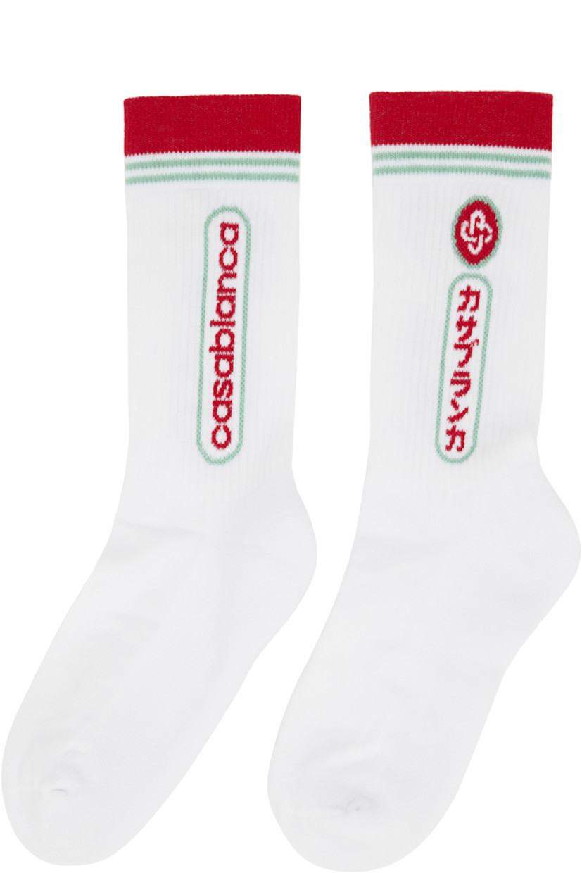 Pair of stretch cotton-blend jersey socks. 

· Rib-knit cuffs 
· Jacquard logo, text, and stripes at cuffs 

Supplier color: White