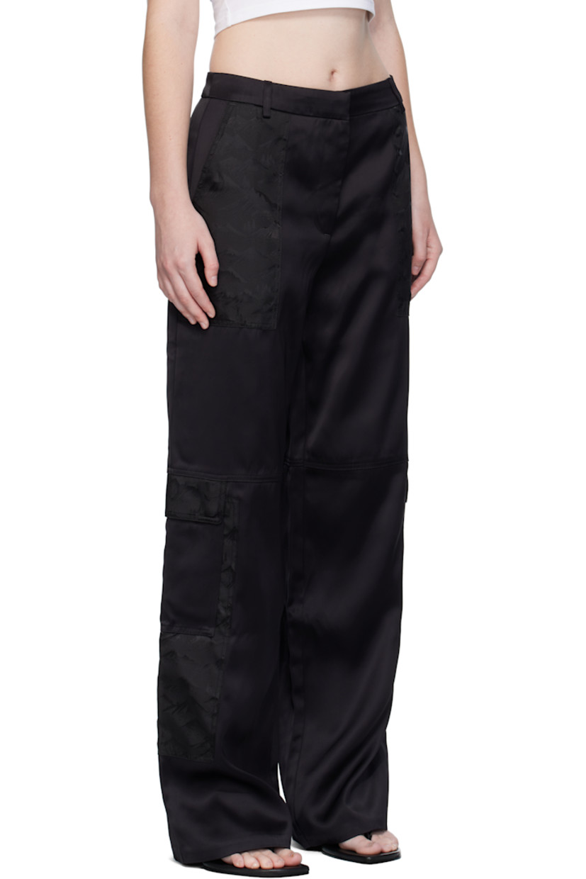 Viscose twill trousers. 

· Jacquard pattern throughout
· Paneled construction
· Straight-leg
· Belt loops
· Four-pocket styling
· Zip fly
· Embroidered logo patch and locker loop at front pocket
· Flap pocket at outseams

Supplier color: Black