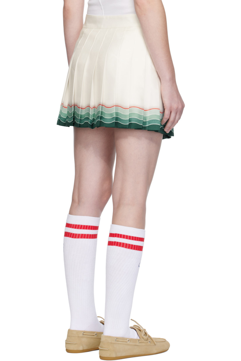Silk twill miniskirt. 

· Knife pleats throughout
· Gradient stripes printed at hem
· Zip closure at side
· Full crêpe lining

Supplier color: White