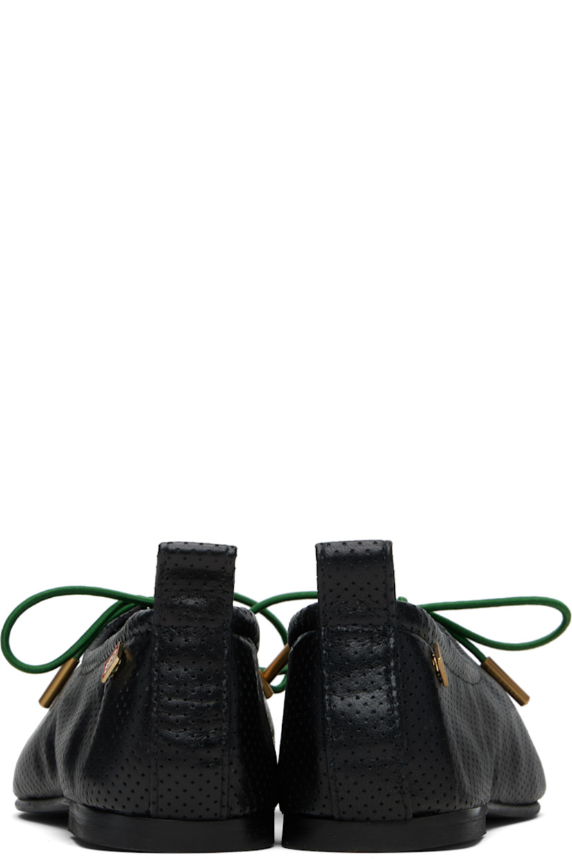 Buffed perforated leather flats.

· Square toe
· Elasticized lace-up keyhole at vamp
· Logo hardware at outer heel
· Pull-loop at heel
· Leather and suede lining
· Rubber sole

Supplier color: Black