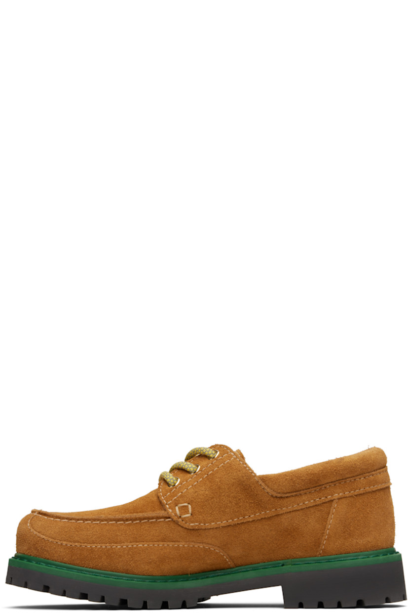 Suede derbys.
 
· Moc toe
· Lace-up closure
· Logo hardware at side
· Padded collar
· Leather lining
· Rubber welt and treaded sole
· Contrast stitching in off-white

Supplier color: Ecru
