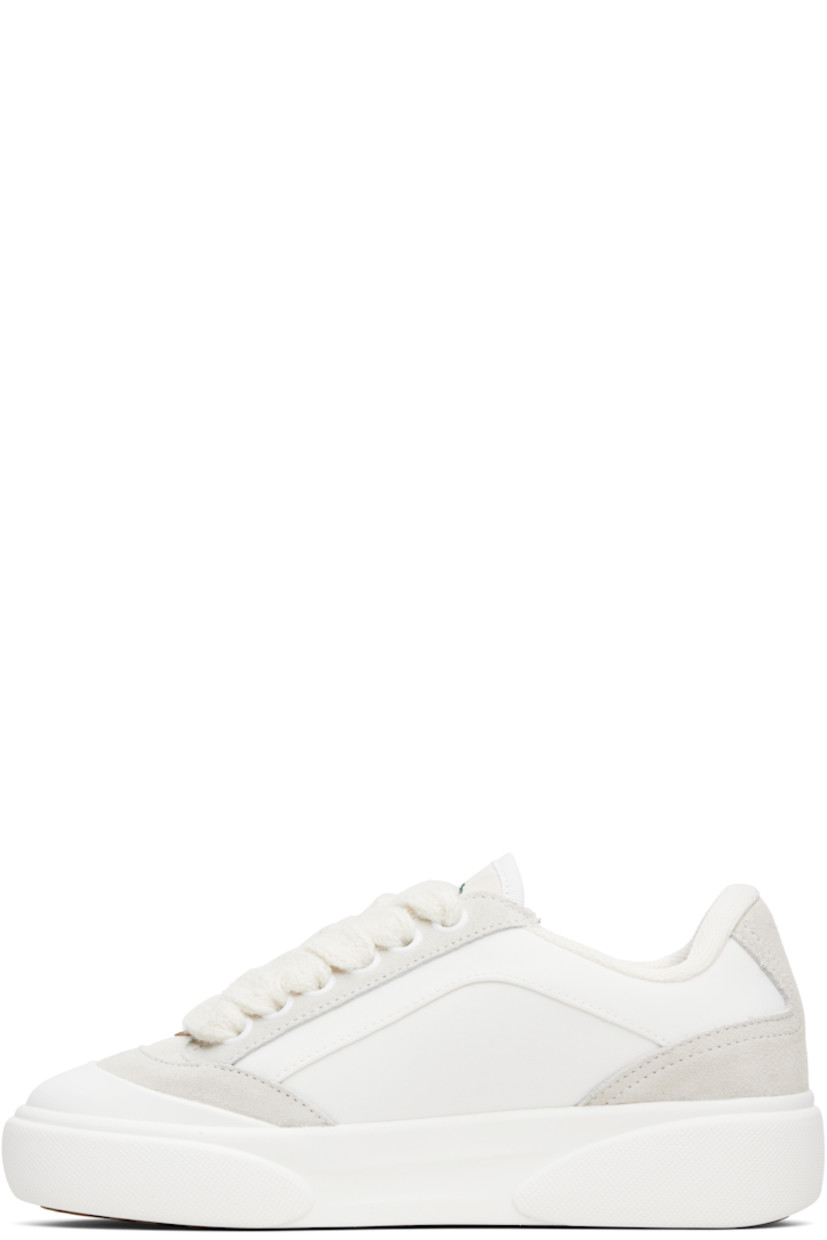 Low-top canvas and suede sneakers.

· Rubber cap toe
· Logo hardware at vamp
· Lace-up closure
· Text embroidered at padded tongue
· Padded collar
· Logo embroidered at outer side
· Mesh lining
· Treaded rubber sole

Supplier color: White