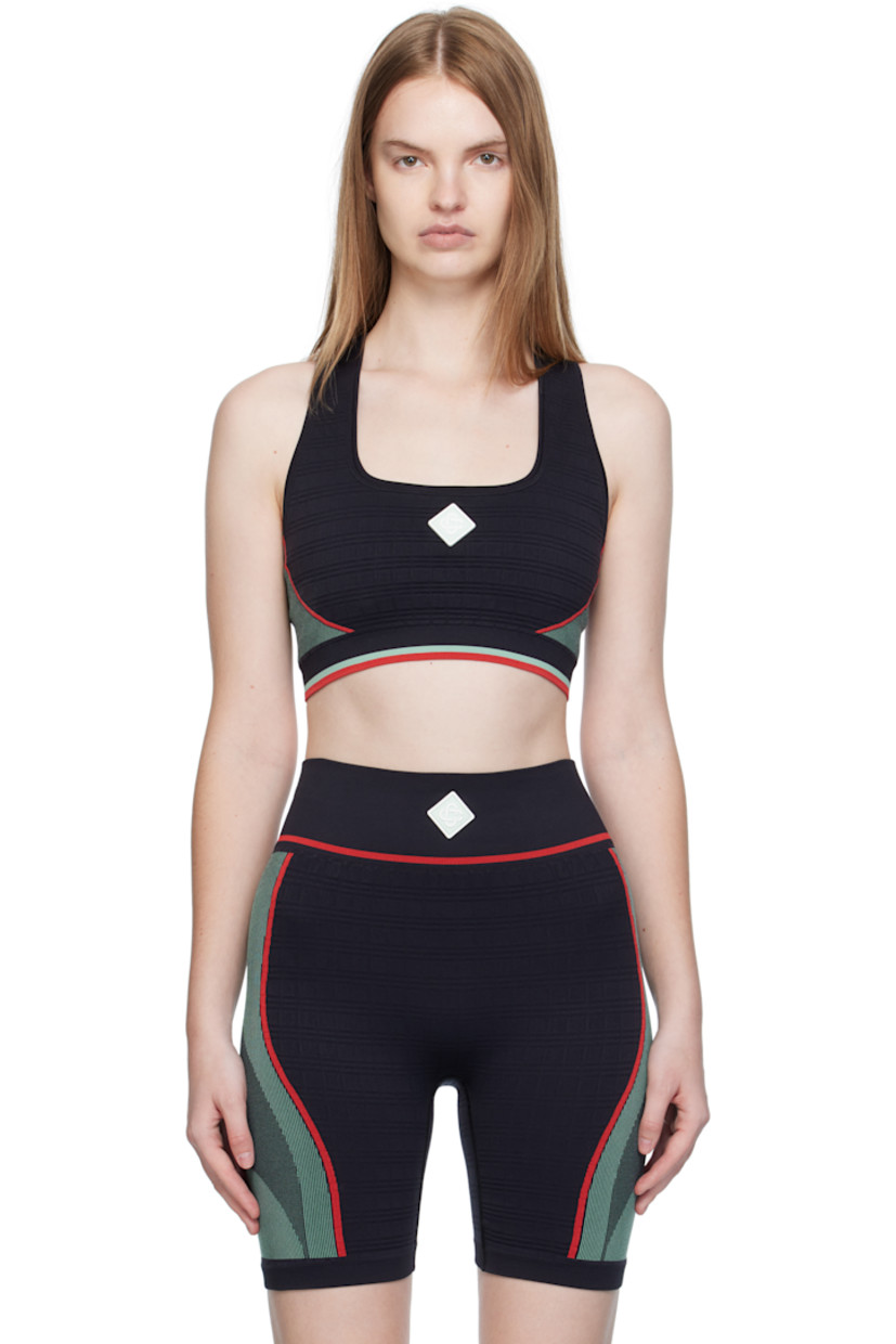 Stretch recycled nylon-blend jersey sport bra.

· Jacquard stripes and check pattern throughout
· Square neck
· Rubberized logo patch at chest
· Elasticized hem
· Racer back

Supplier color: Black