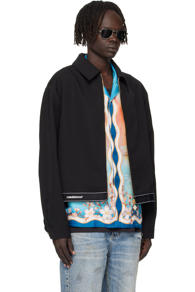 Wool twill jacket.

· Spread collar
· Zip closure
· Seam pockets
· Logo bonded at front hem
· Elasticized hem
· Press-stud barrel cuffs
· Welt pocket at interior
· Full satin lining

Supplier color: Black