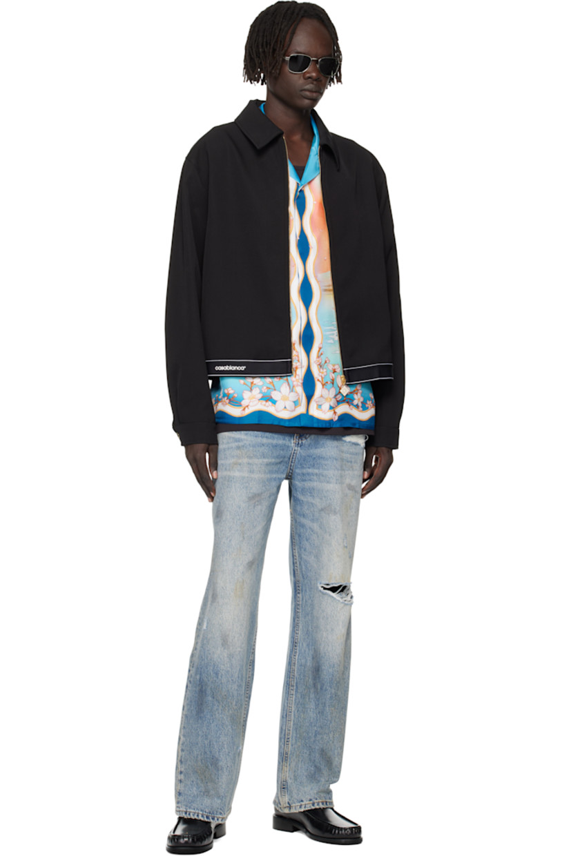 Wool twill jacket.

· Spread collar
· Zip closure
· Seam pockets
· Logo bonded at front hem
· Elasticized hem
· Press-stud barrel cuffs
· Welt pocket at interior
· Full satin lining

Supplier color: Black