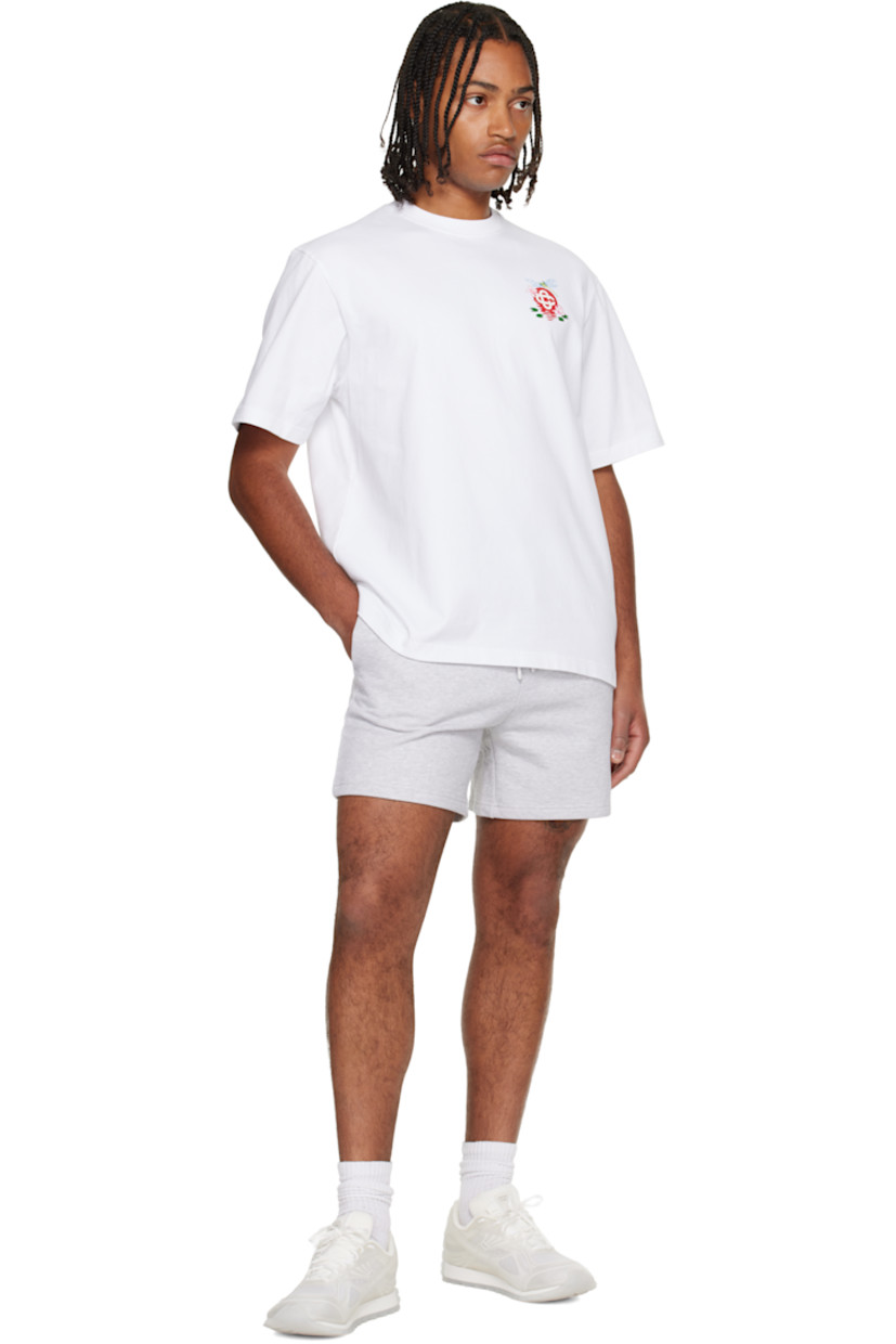 Organic cotton jersey T-shirt. 

· Rib-knit crewneck
· Logo graphic printed at chest
· Dropped shoulders

Supplier color: White