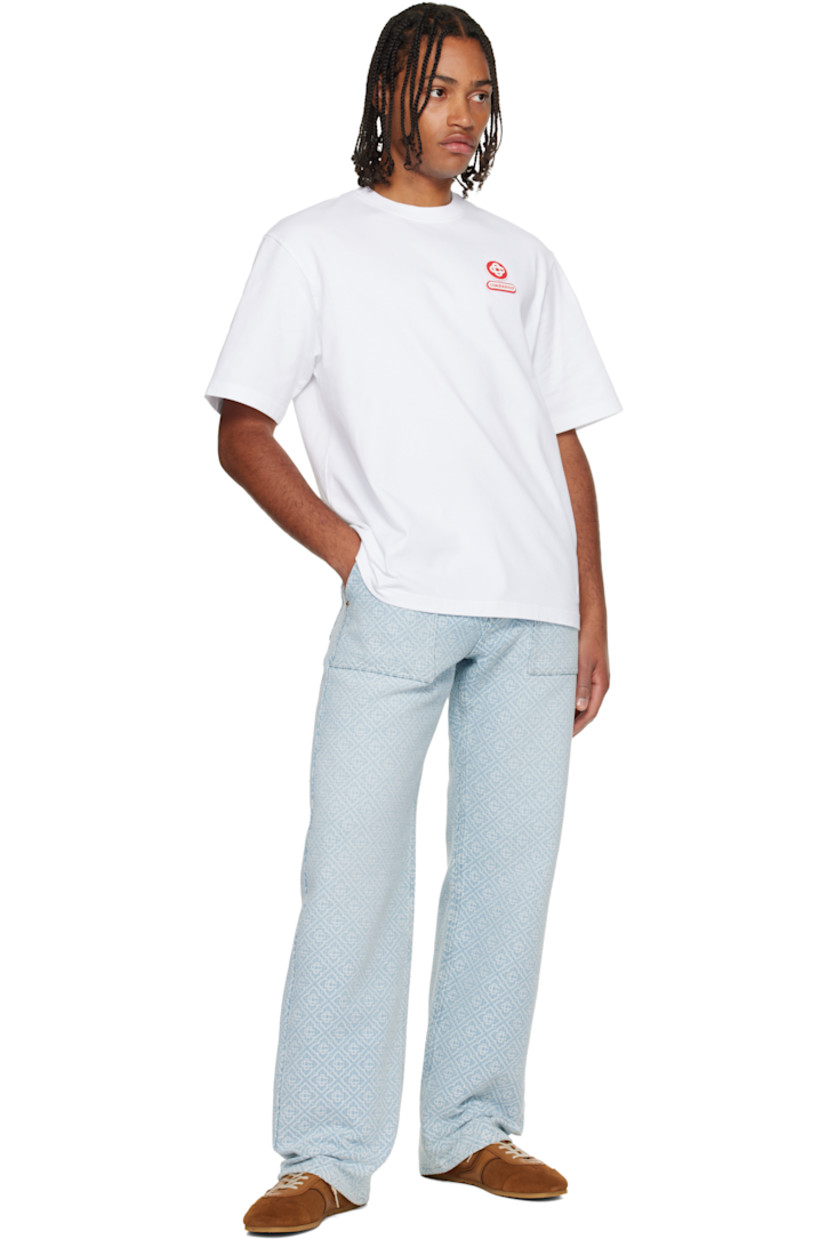 Organic cotton jersey T-shirt. 

· Rib-knit crewneck
· Rubber logo patches at chest 

Supplier color: White