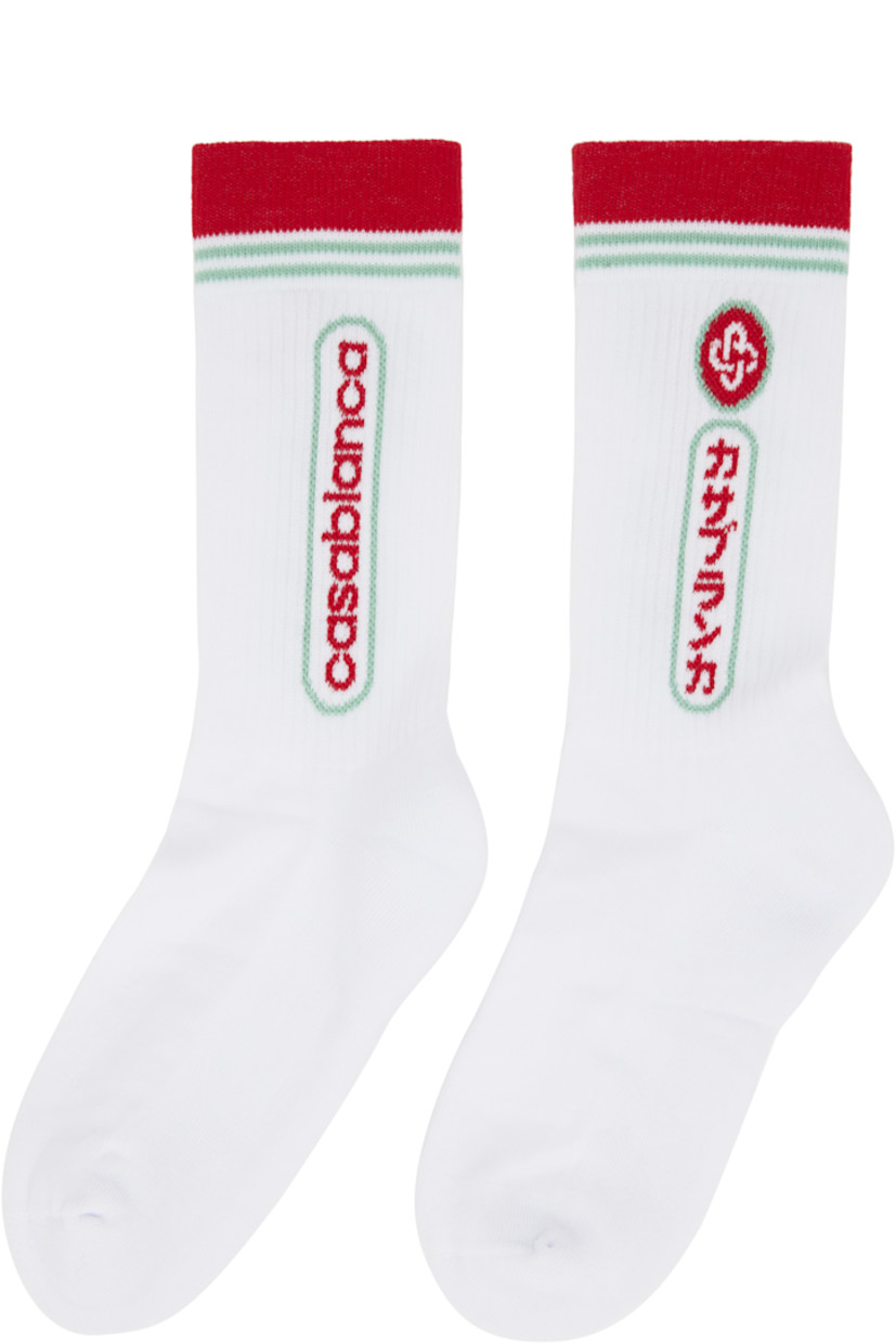 Pair of stretch cotton-blend jersey socks. 

· Rib-knit cuffs 
· Jacquard logo, text, and stripes at cuffs 

Supplier color: White