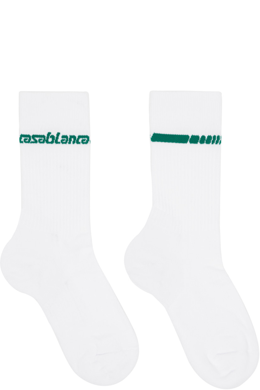 Pair of mid-calf knit stretch cotton-blend socks. Jacquard logo at rib-knit cuffs.

Supplier color: White