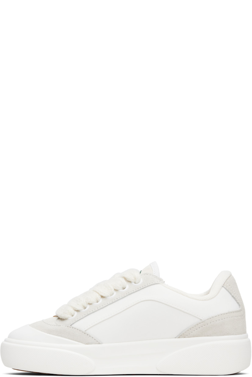 Low-top canvas and suede sneakers.

· Rubber cap toe
· Logo hardware at vamp
· Lace-up closure
· Text embroidered at padded tongue
· Padded collar
· Logo embroidered at outer side
· Mesh lining
· Treaded rubber sole

Supplier color: White