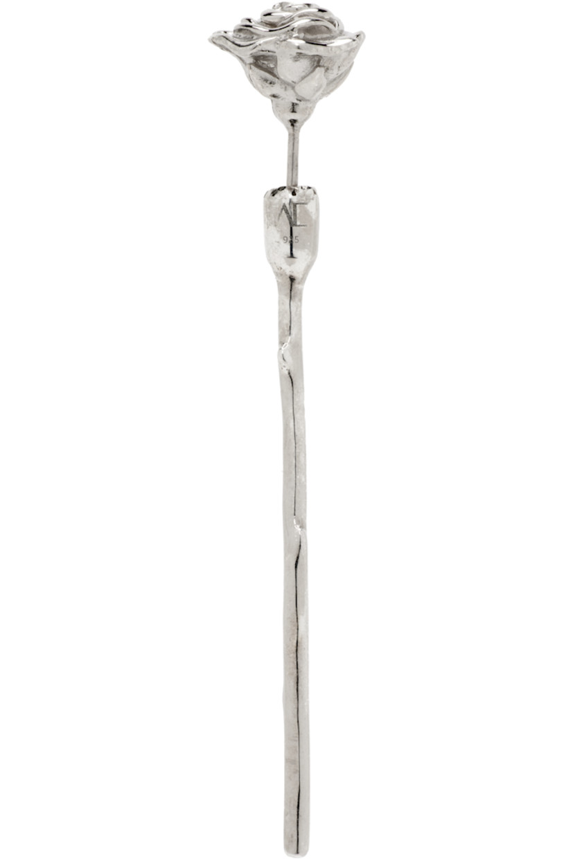 Handcrafted single drop earring in sterling silver.

· Floral graphic at face
· Post-stud fastening
· H2.25" x W0.5"

Supplier color: Rhodium vermeil