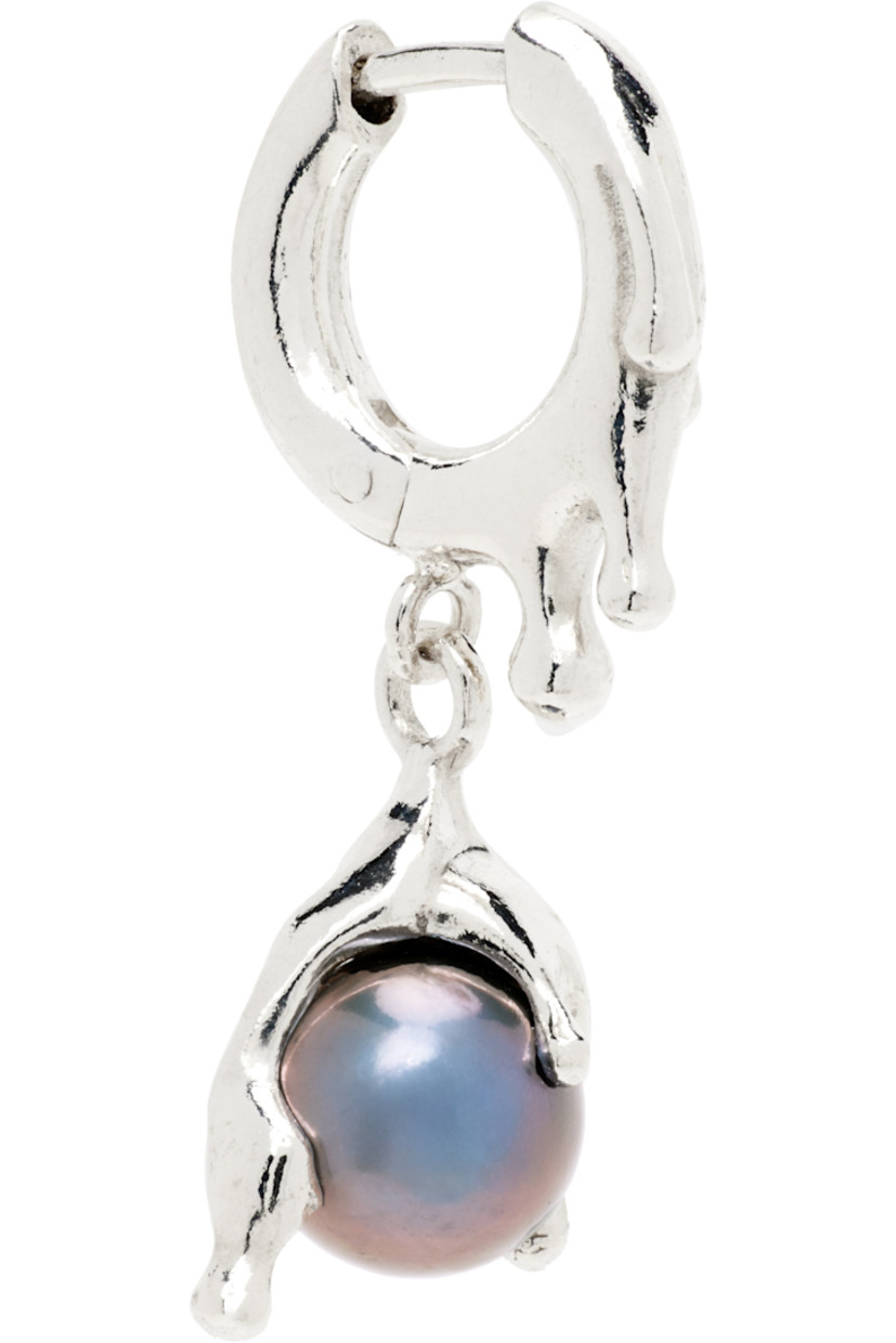 Handcrafted single drop earring in sterling silver.

· Graphic with black freshwater pearl at drop
· Hinged-post fastening
· H1" x W0.5"

Supplier color: Rhodium vermeil