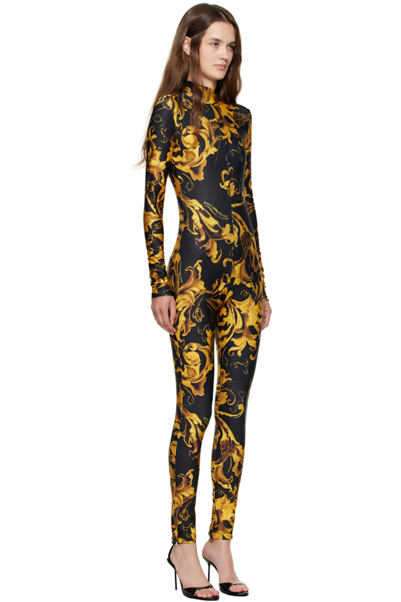 Stretch jersey jumpsuit.

· Barocco pattern printed throughout
· Stand collar
· Zip closure at back

Supplier color: Black/Gold
